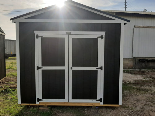 10x16 Utility shed with a black roof, driftwood exterior and a white trim